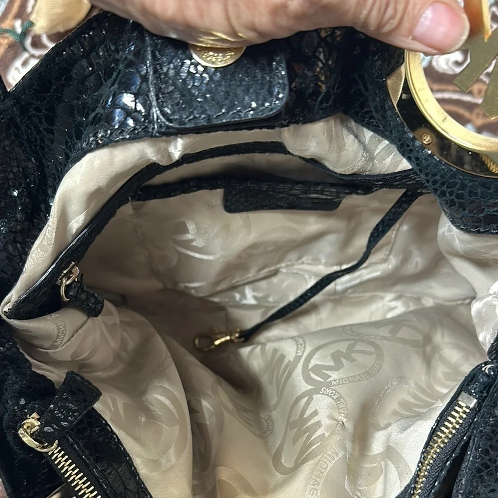Michael Kors Black Hobo Bag with Gold Emblem